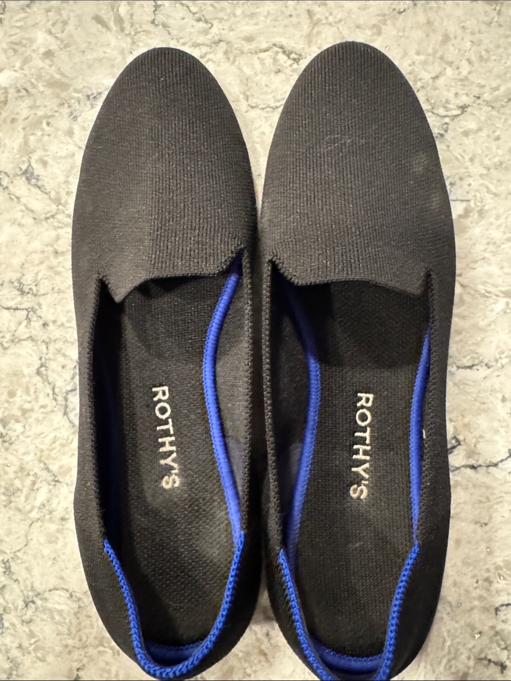Rothy's Black Knit Slip-Ons with Blue Interior Trim